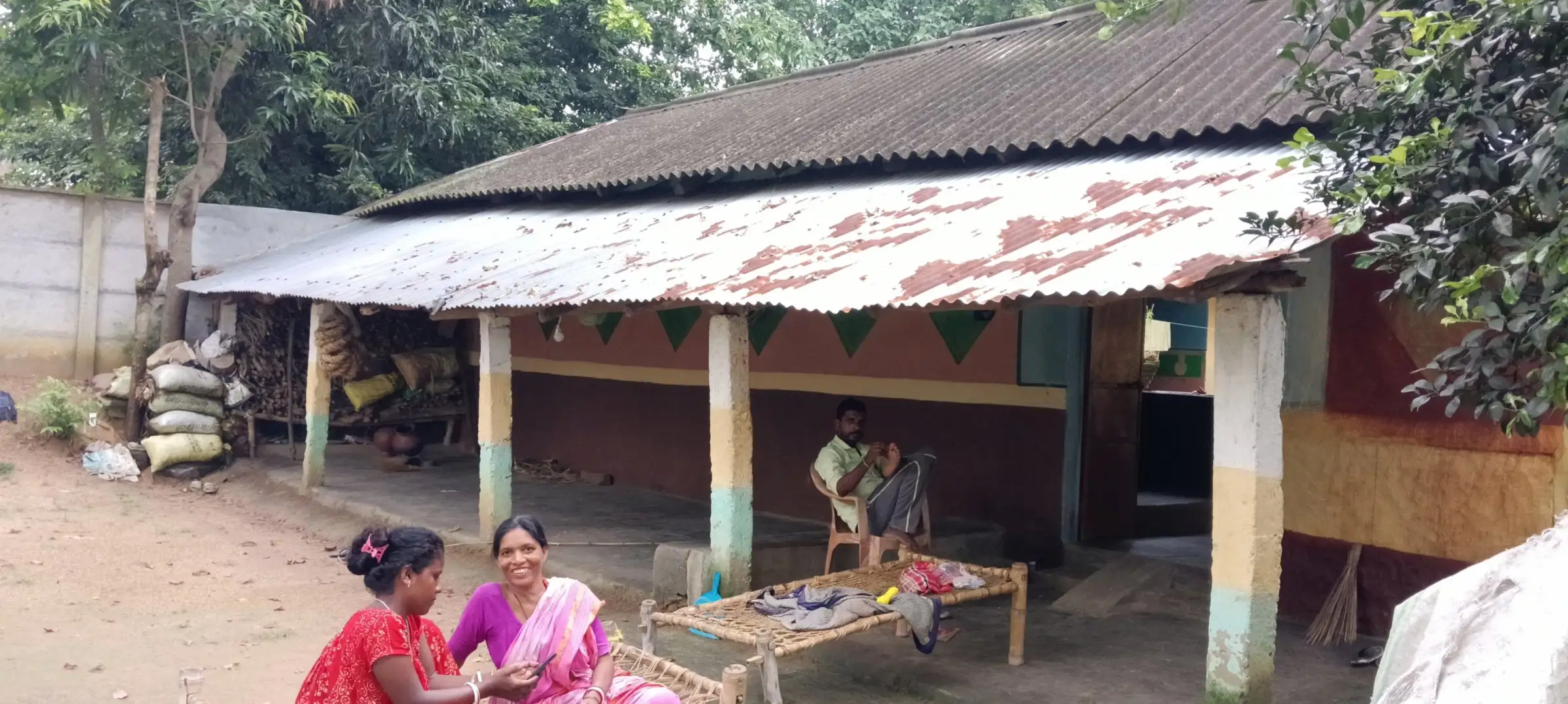 Shaded veranda of a tiled-roof homestead